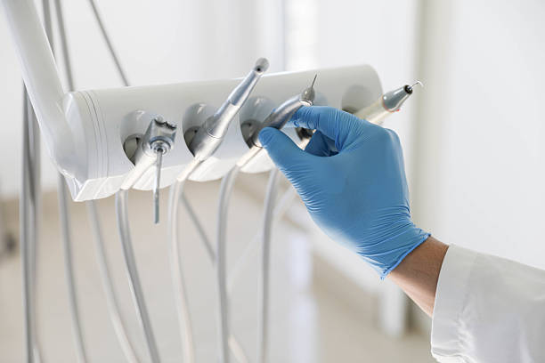 Professional Invisalign Clear Aligners technician working in White Oak, MS